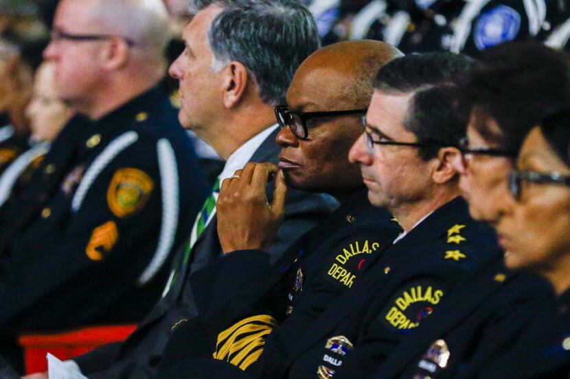 Dallas police Chief David Brown (center) attends the funeral of Officer Patrick Zamarripa,...