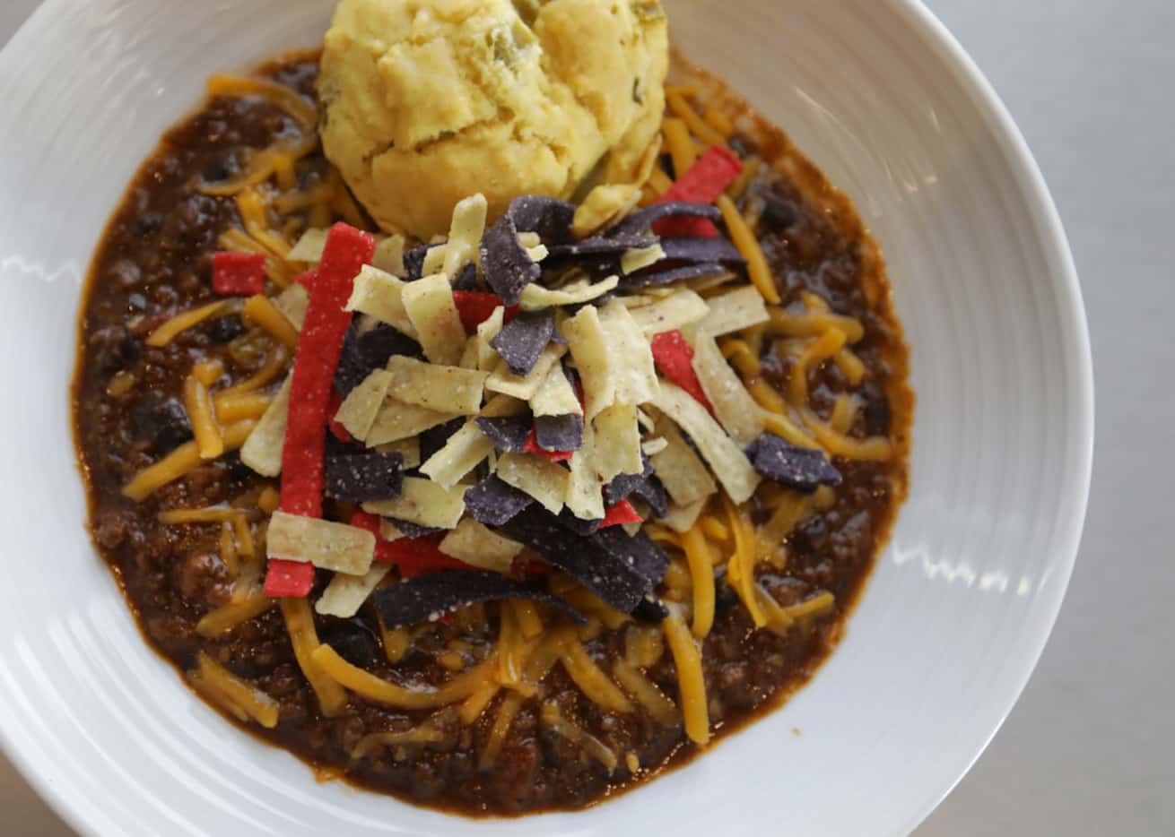 Southwest Chili includes ground Wagyu beef and black beans topped with fried onion strings,...