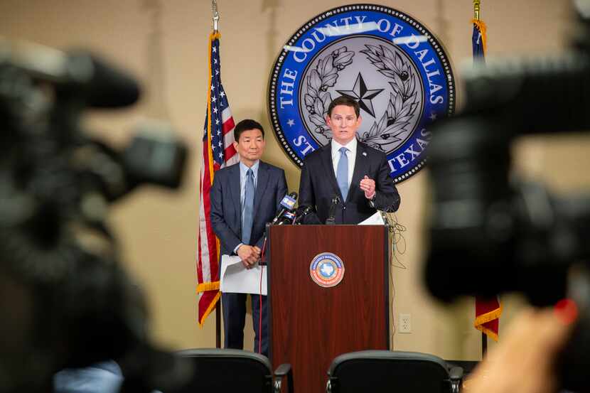 Dallas County Judge Clay Jenkins (right) and Dr. Philip Huang, Director of Dallas County...