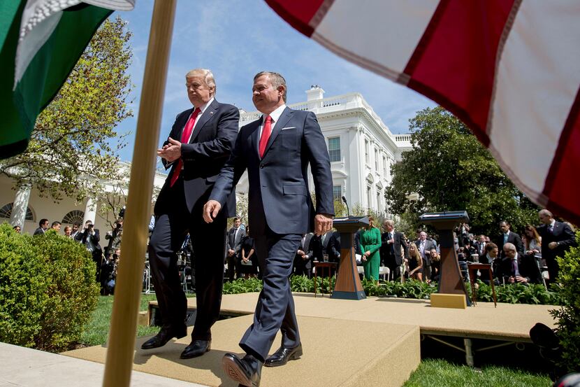 President Donald Trump and Jordan's King Abdullah II leave their news conference in the Rose...
