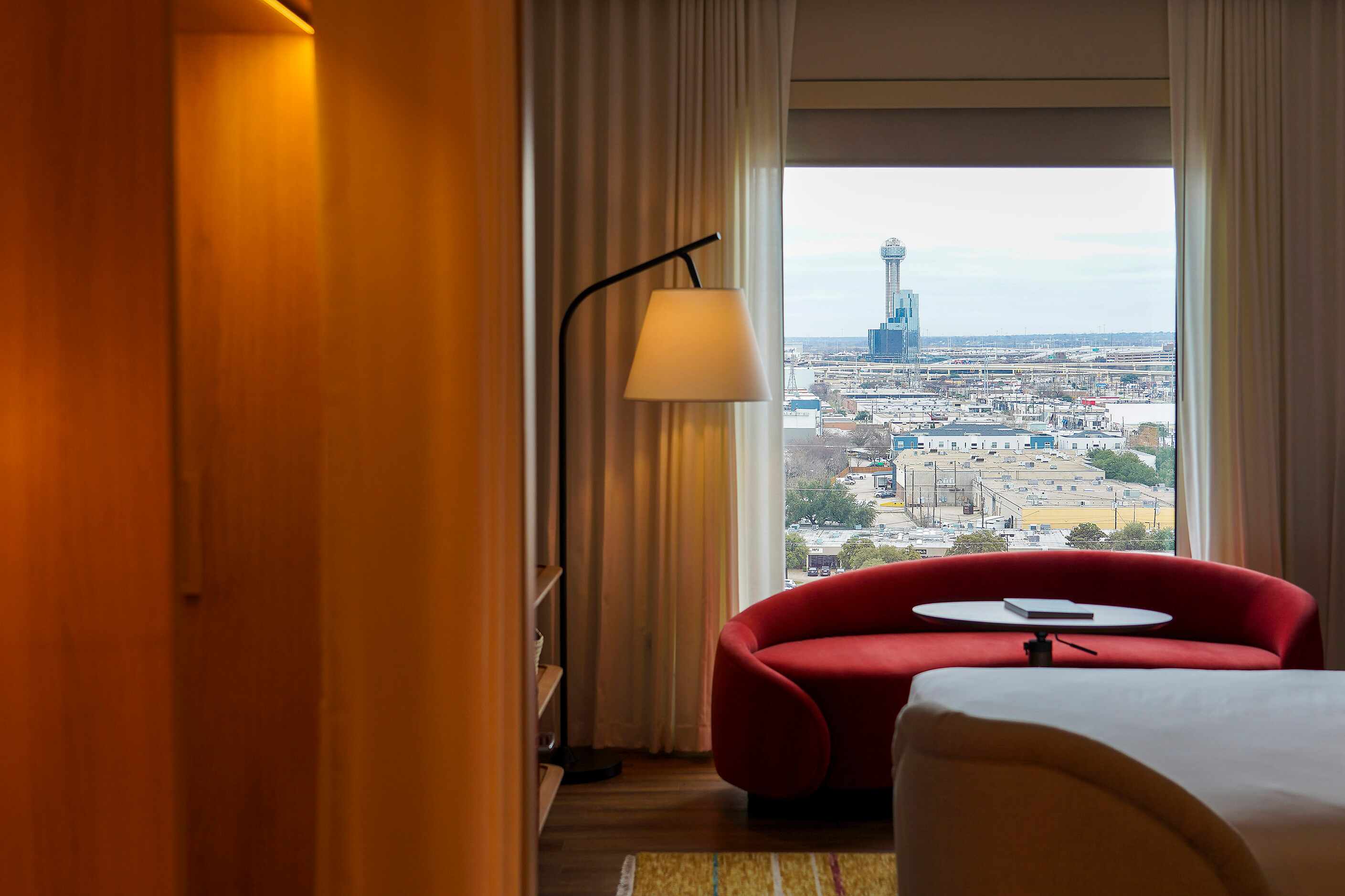 Reunion tower is seen through the windows of a standard Chamber at the new the Virgin Hotels...