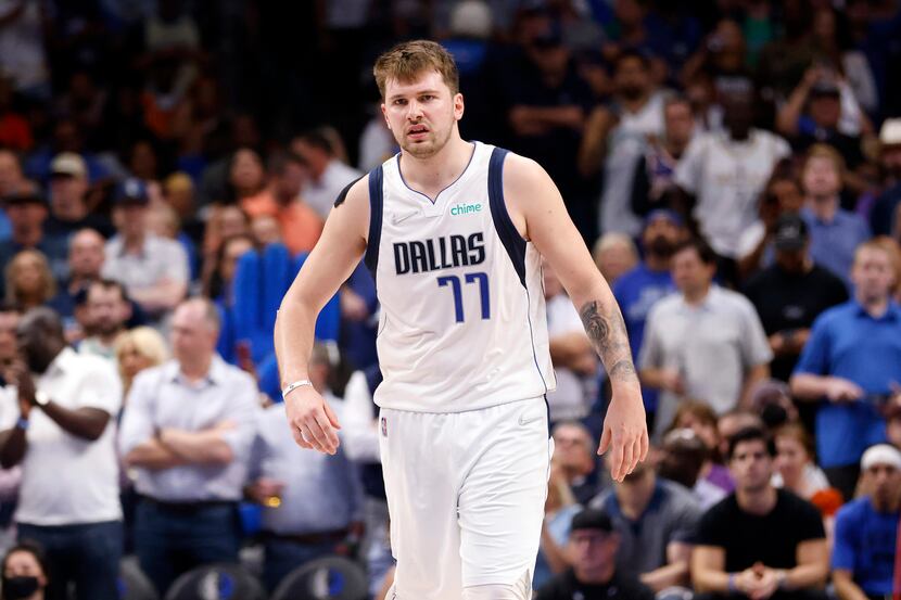 Dallas Mavericks guard Luka Doncic (77) reacts late in the fourth quarter as they pulled...