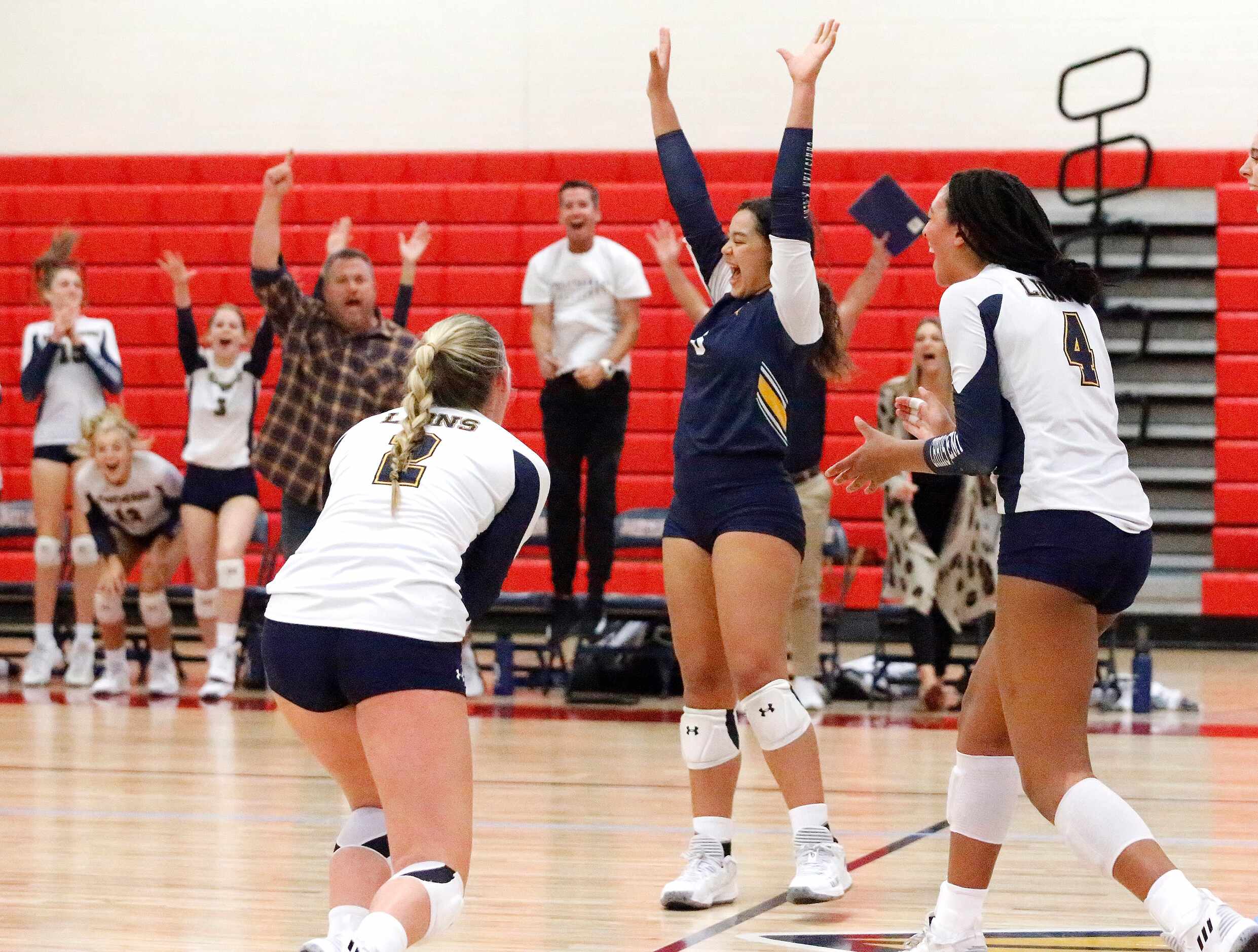 Prestonwood Christian Academy libero Gillian Pitts (8) reacts to a come from behind victory...