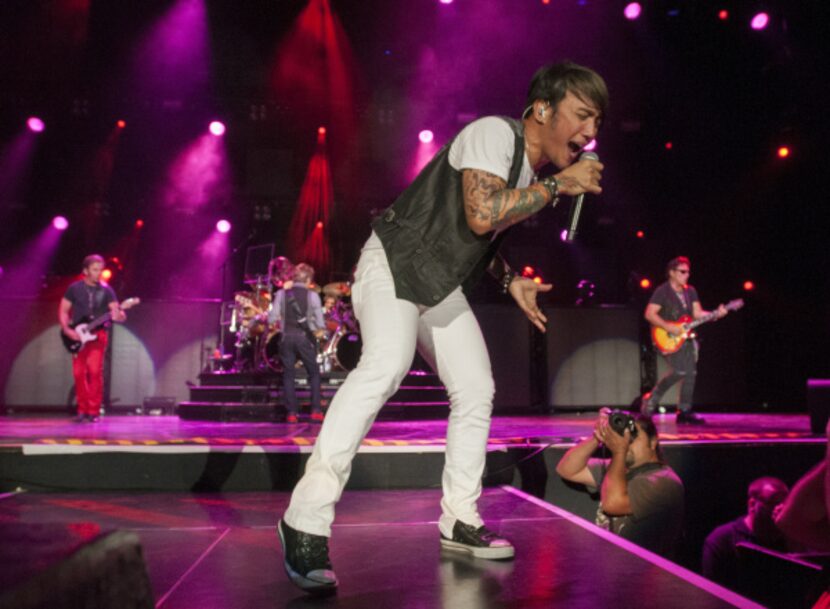 Arnel Pineda, the lead singer of Journey performs at the Gexa Energy Pavilion on Saturday,...