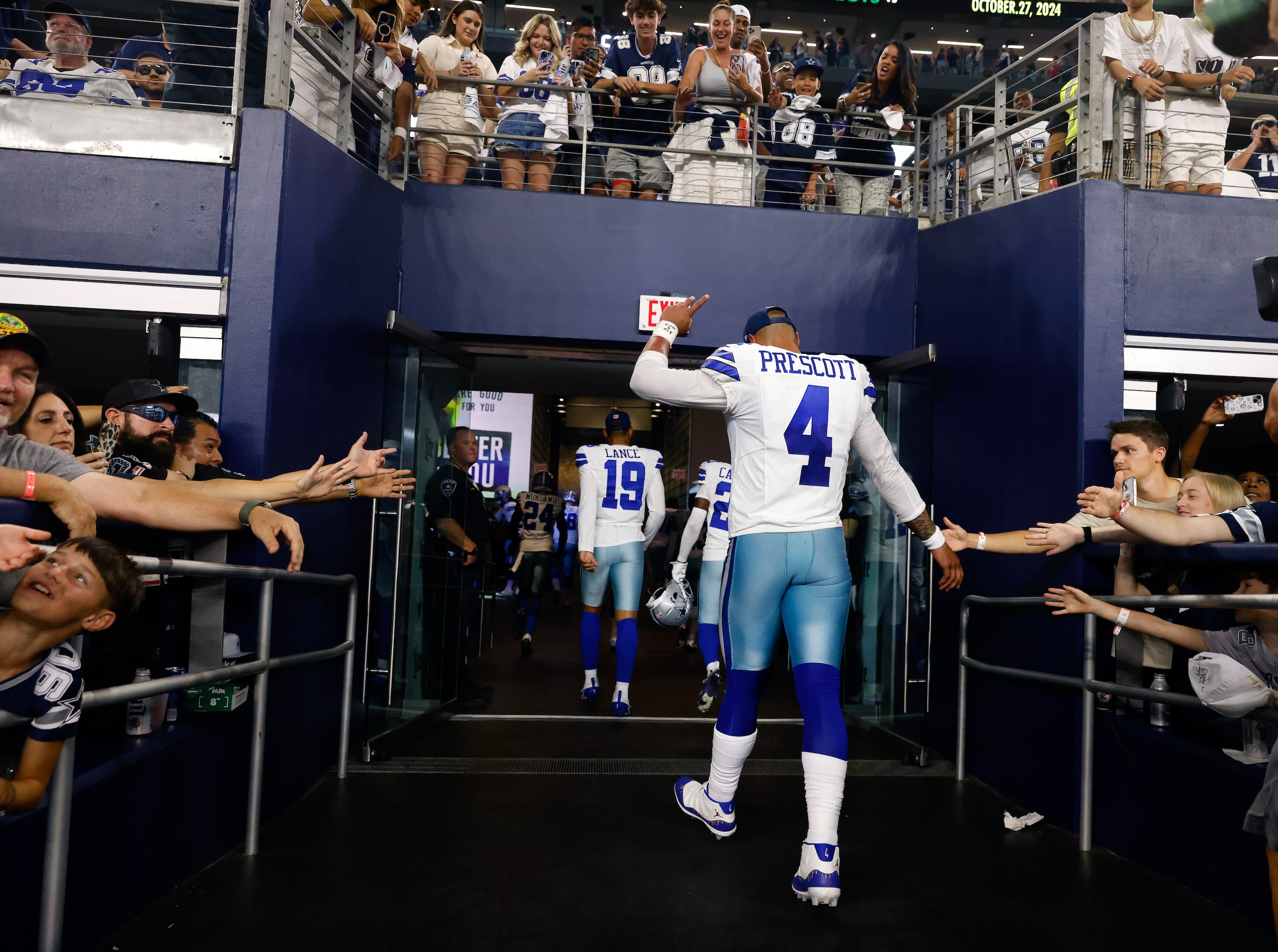 Dallas Cowboys quarterback Dak Prescott (4) walks to the locker room following their 28-25...