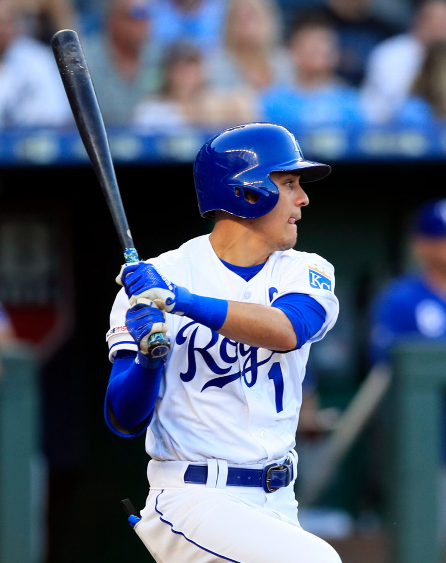 Kansas City Royals' Nicky Lopez hits a double off Texas Rangers starting pitcher Mike Minor...