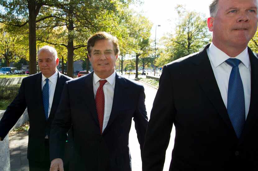 Paul Manafort accompanied by his lawyers, arrives at Federal Court, in Washington, Thursday,...