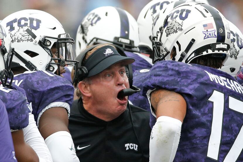 TCU head coach Gary Patterson fires up his troops on the sidelines in the second quarter...