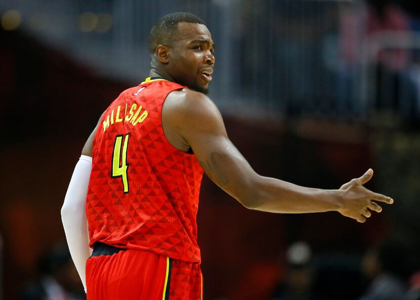 Atlanta Hawks forward Paul Millsap (4) reacts in the first half of an NBA basketball game...
