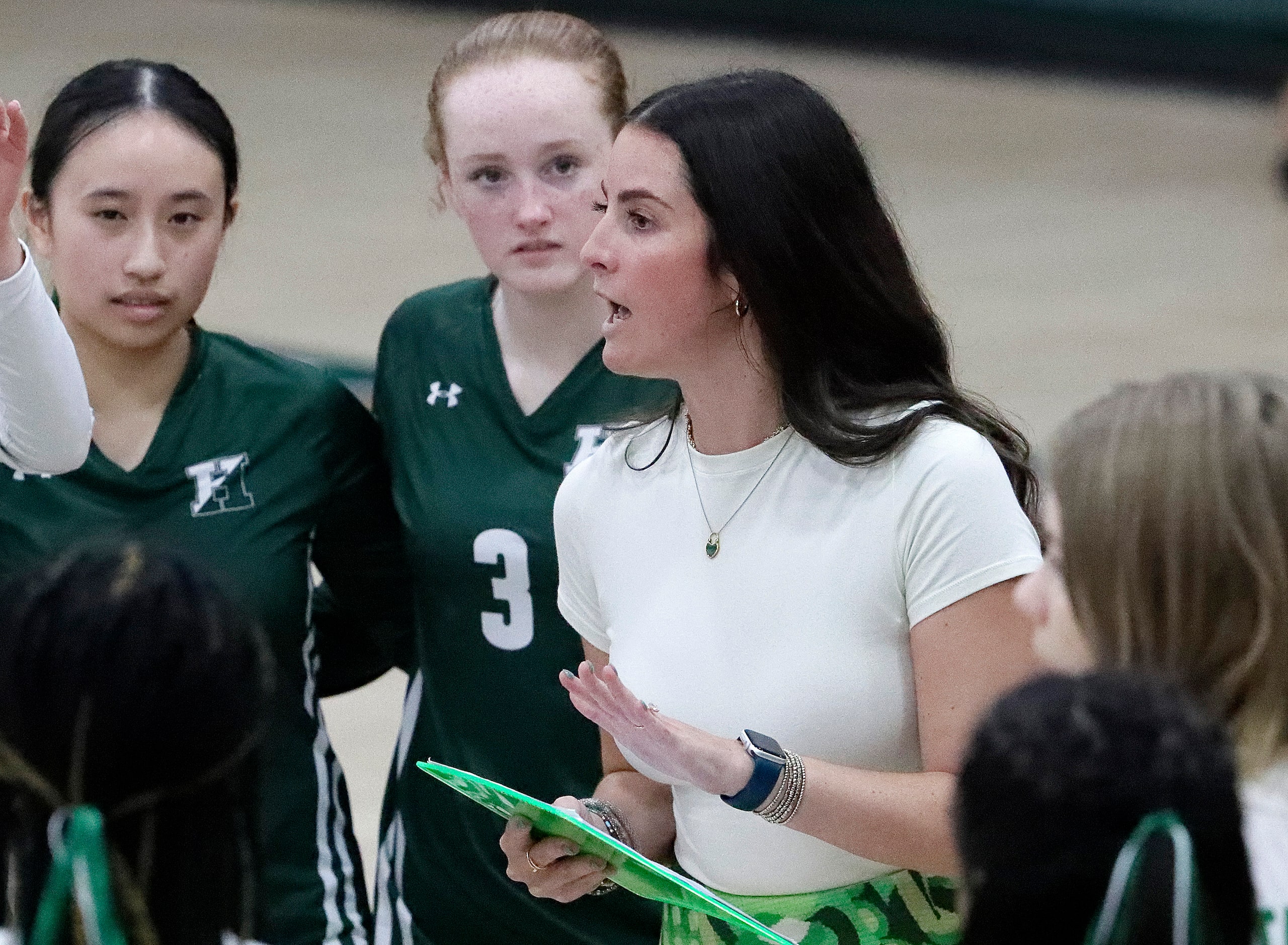 Hockaday head coach Allison Camp runs a time out during game two as Hockaday played Houston...