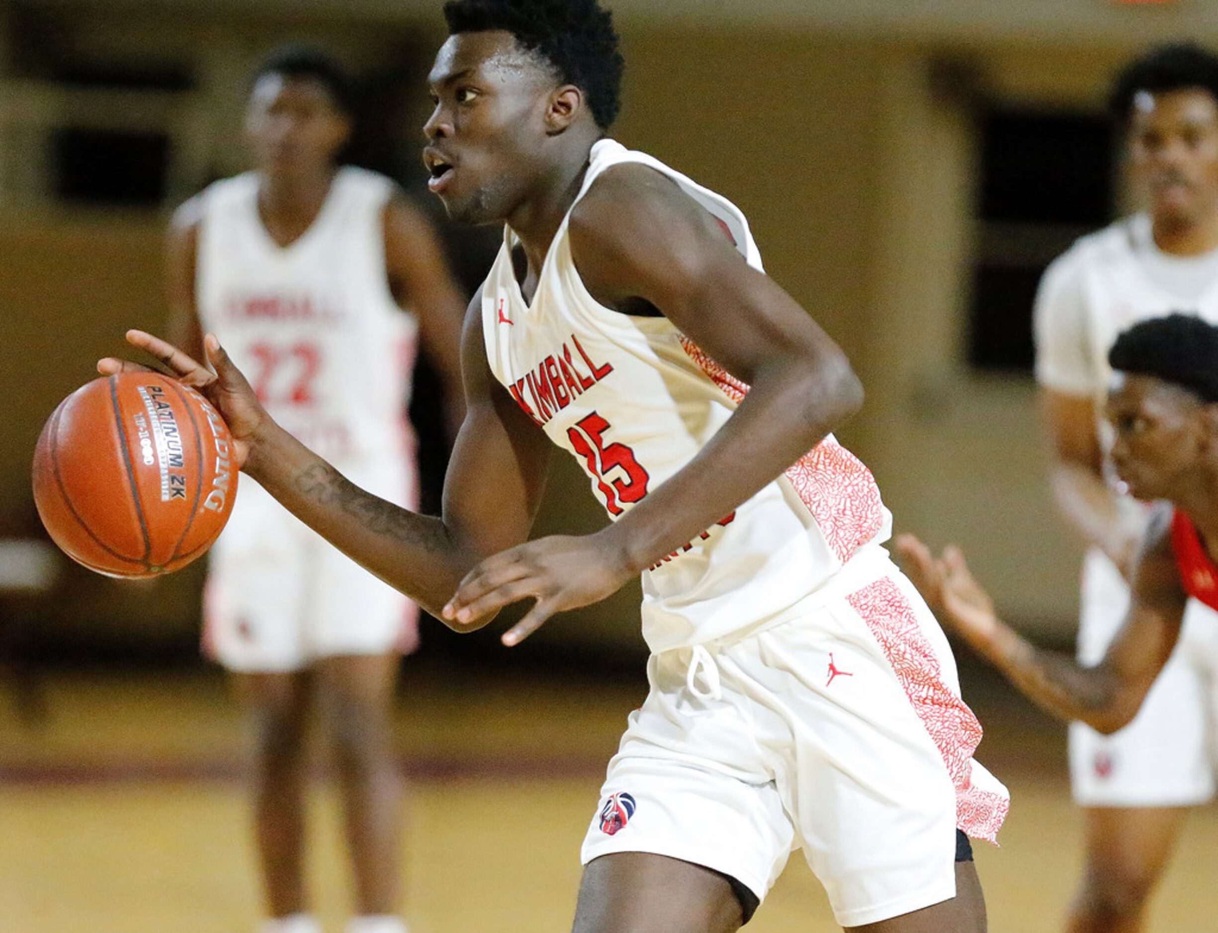 Kimball High School small forward Kyron Henderson (15) breaks for the basket during the...