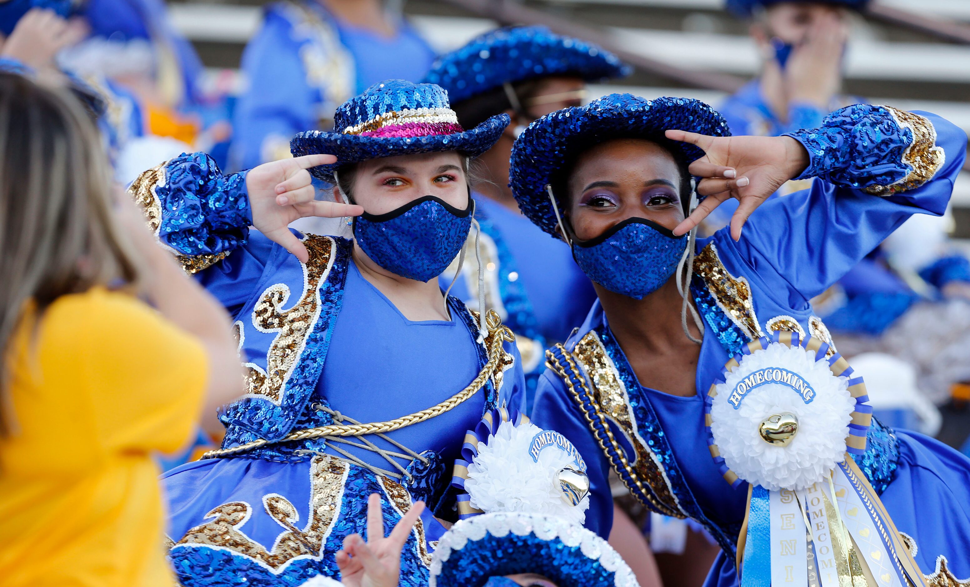 Lakeview Centennial Sweethearts drill team sergeants Avery Qualls, left, a junior, and Mba...