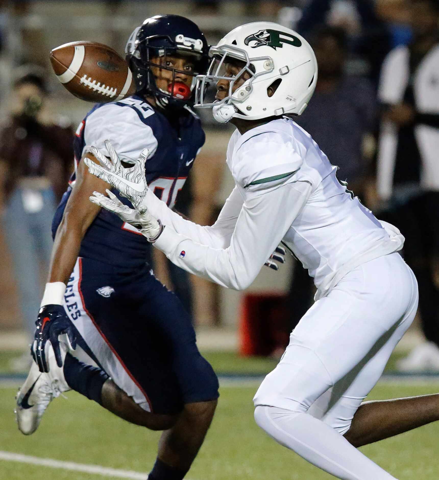 Prosper High School Devoncy Maloy (6) catches a long pass near the goal line in front of...