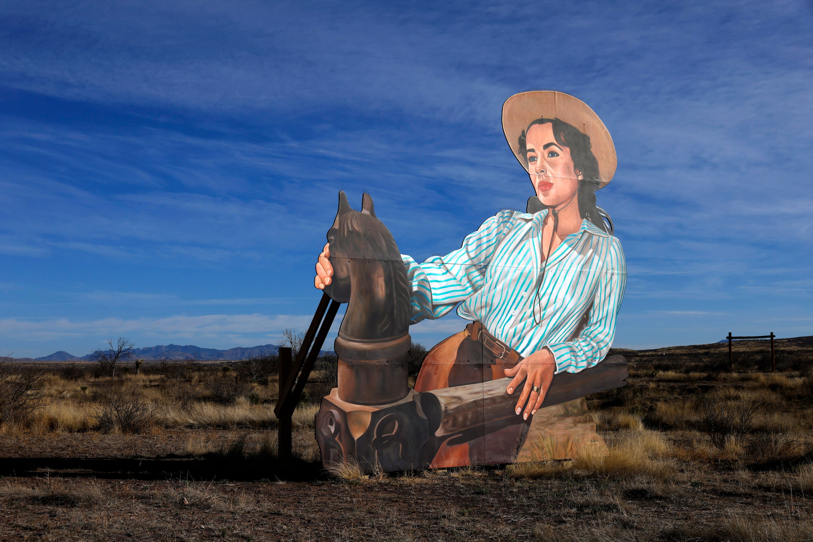 A larger-than-life, standing mural of the movie actor Elizabeth Taylor is part of the Giant...