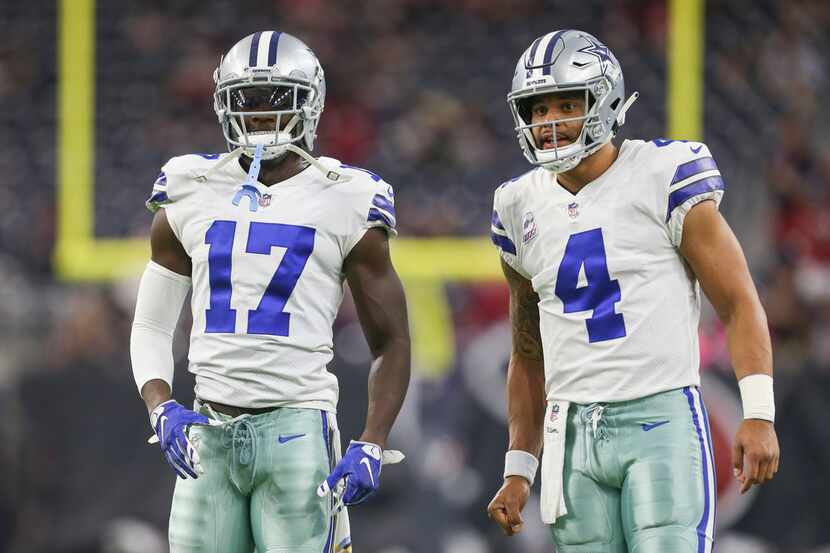 Dallas Cowboys wide receiver Allen Hurns (17) and quarterback Dak Prescott (4) warm up prior...