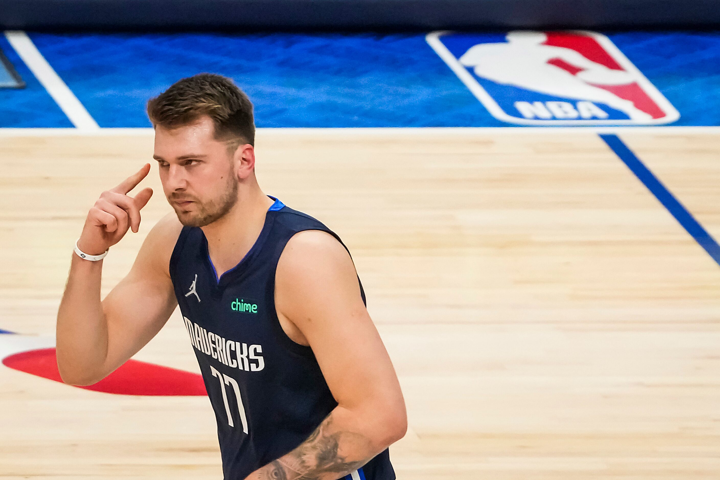 Dallas Mavericks guard Luka Doncic reacts after being fouled during the first half in Game 5...