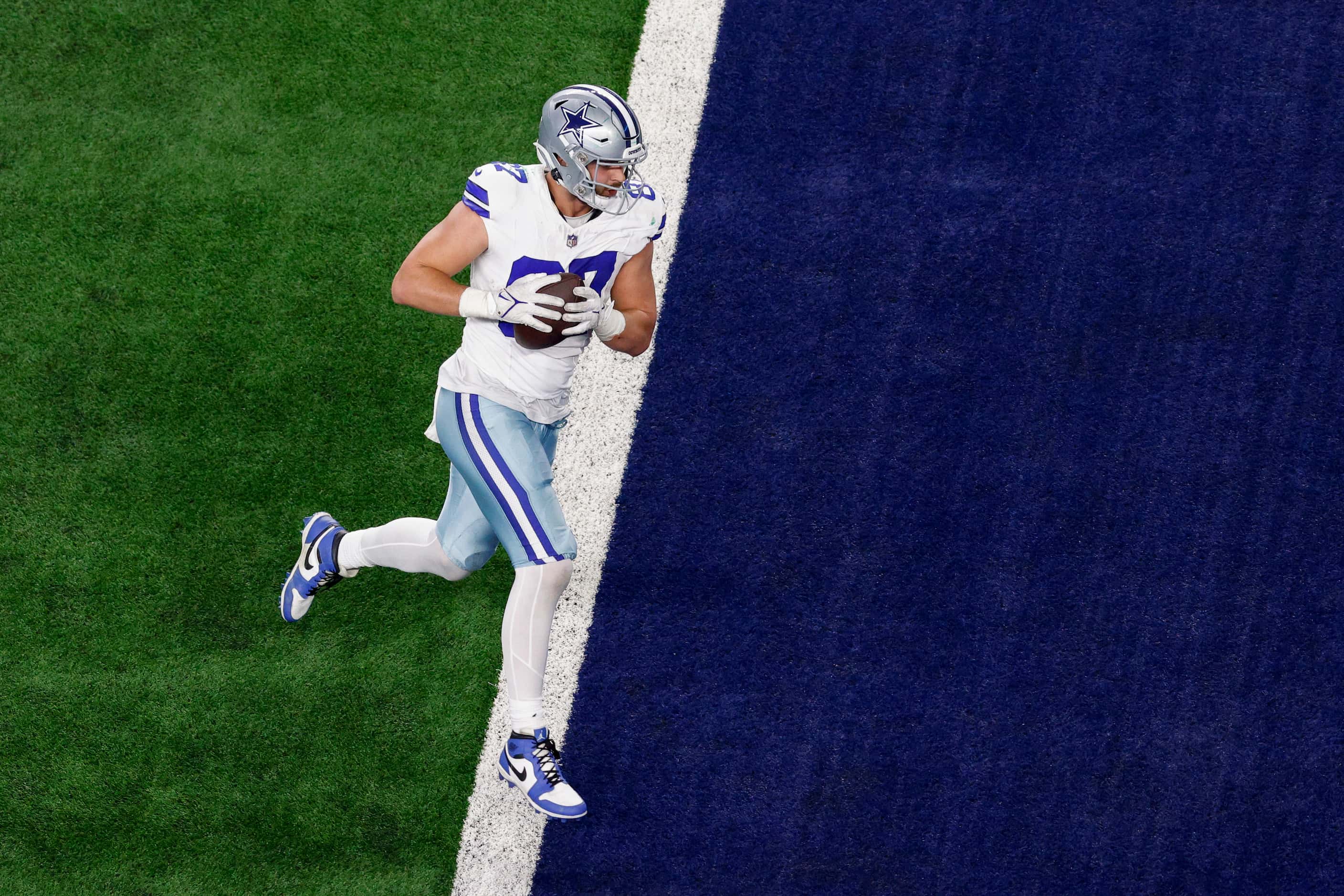 Dallas Cowboys tight end Jake Ferguson (87) scores a touchdown after a reception during the...