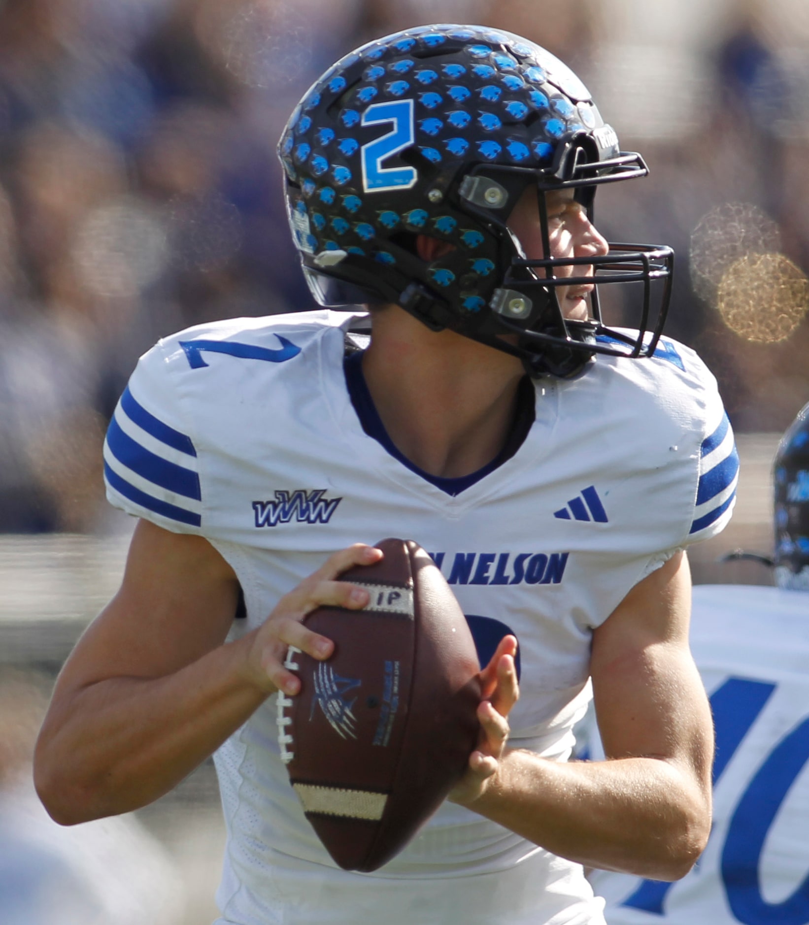 Byron Nelson quarterback Grant Bizjack (2) looks to pass during second half action against...