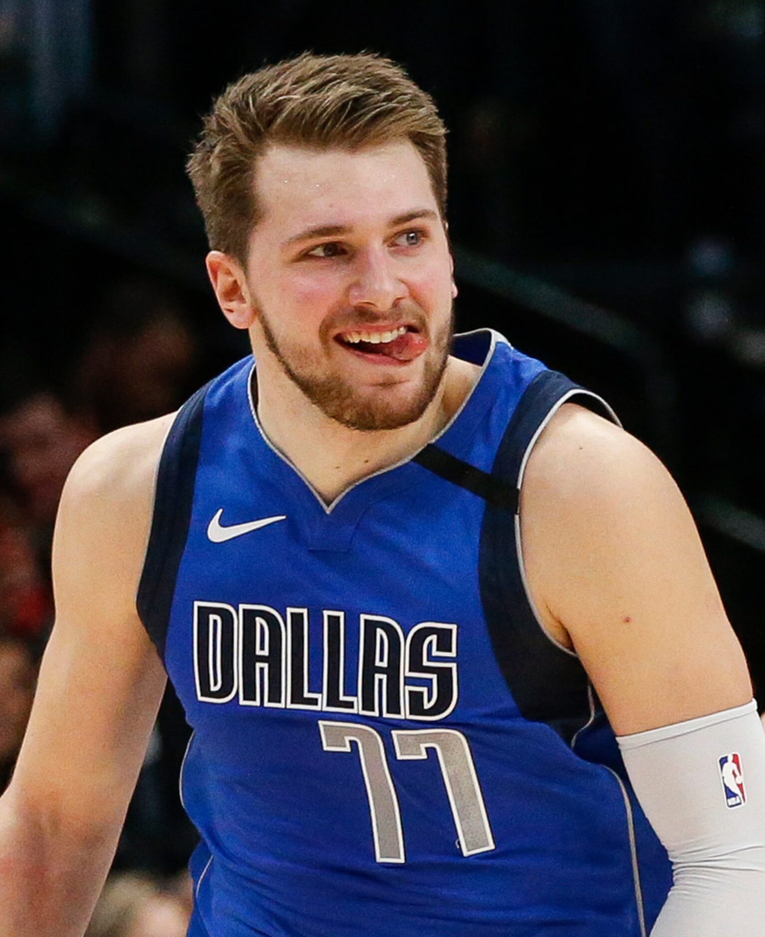 Dallas Mavericks forward Luka Doncic (77) celebrates a play during the second half of a NBA...