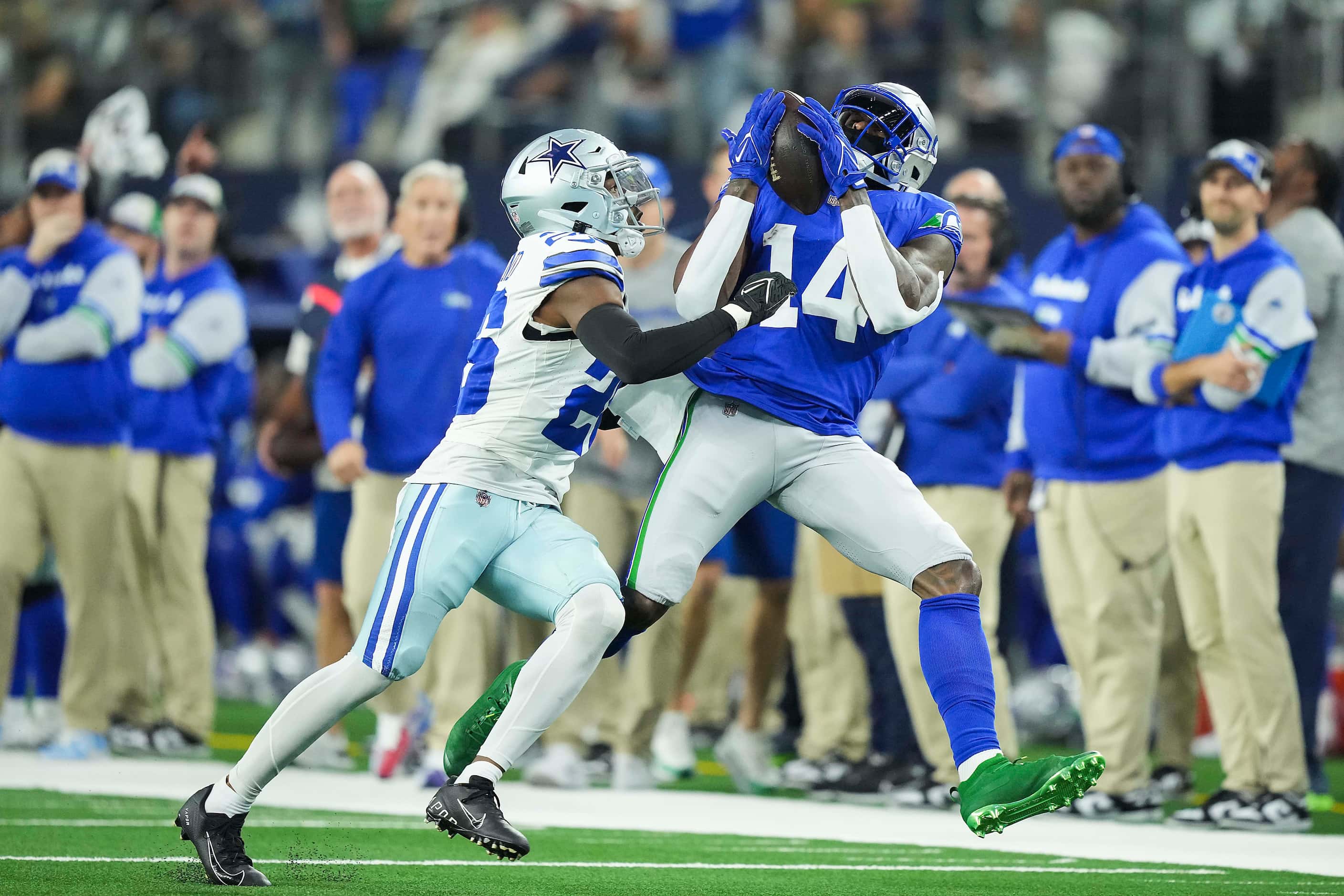 Seattle Seahawks wide receiver DK Metcalf (14) catches a pass as Dallas Cowboys cornerback...