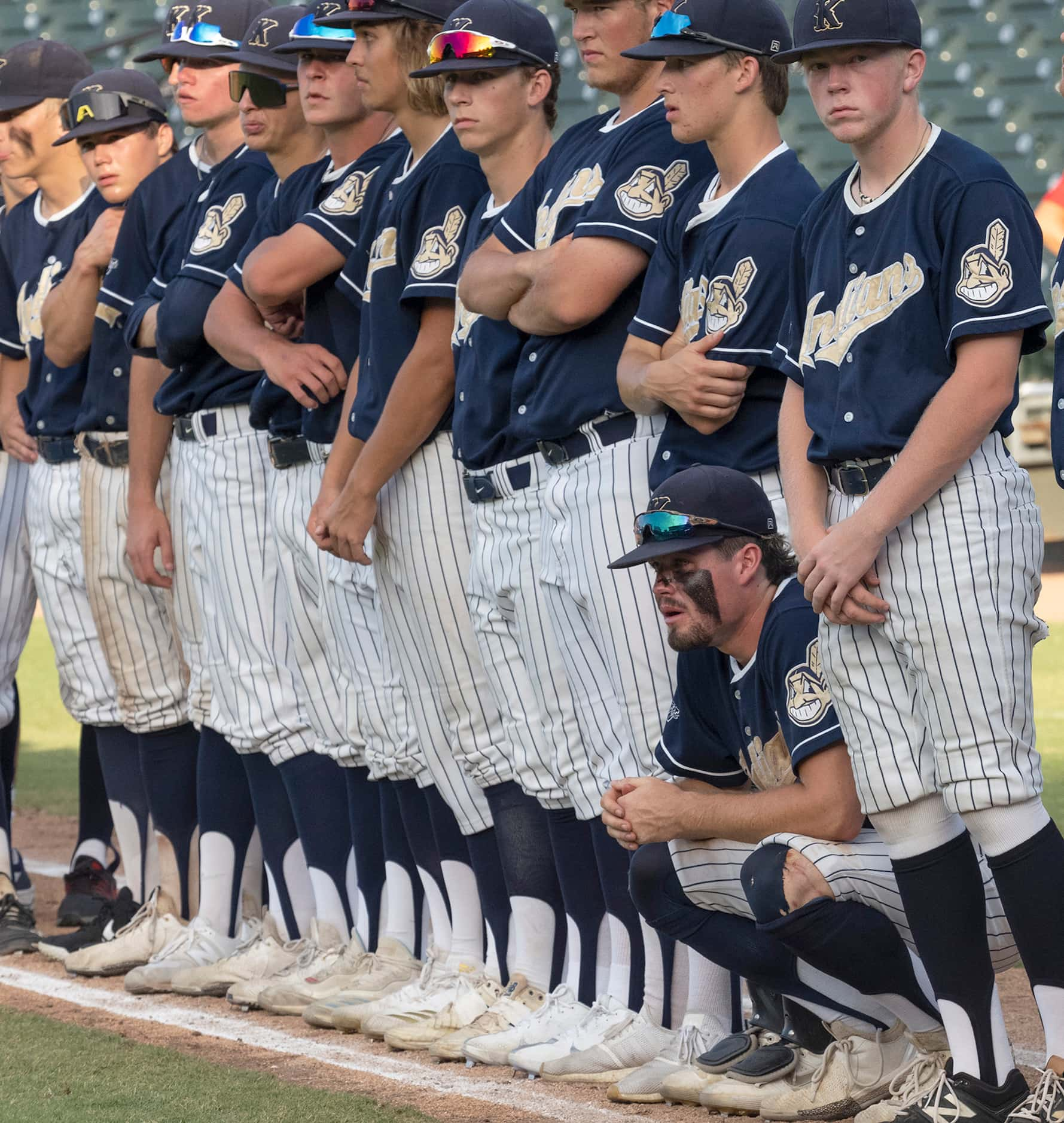 Members of the Keller Indians look on as the Rockwall-Heath Hawks celebrate their state...