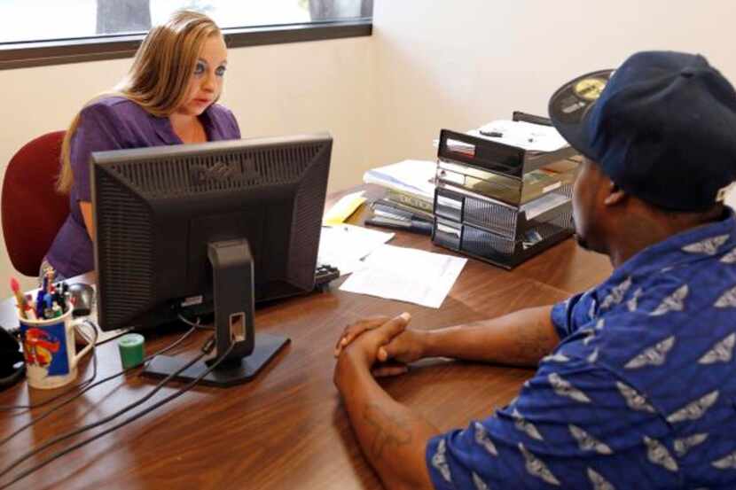 
Casey Short, a worker at Texas ReEntry Services, helps ex-offenders like herself navigate...