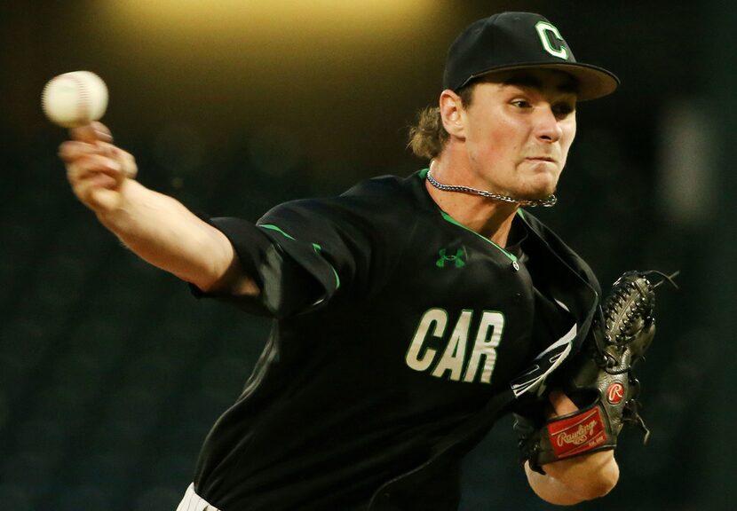 Carroll pitcher Nicco Cole (8) pitches in the first inning during game 2 of the best-of-3...