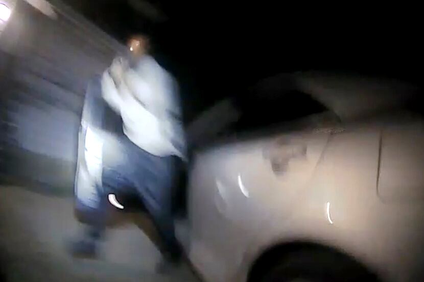 A video frame grab shows Schaston Hodge as he emerges from his car holding a gun on Aug. 17,...