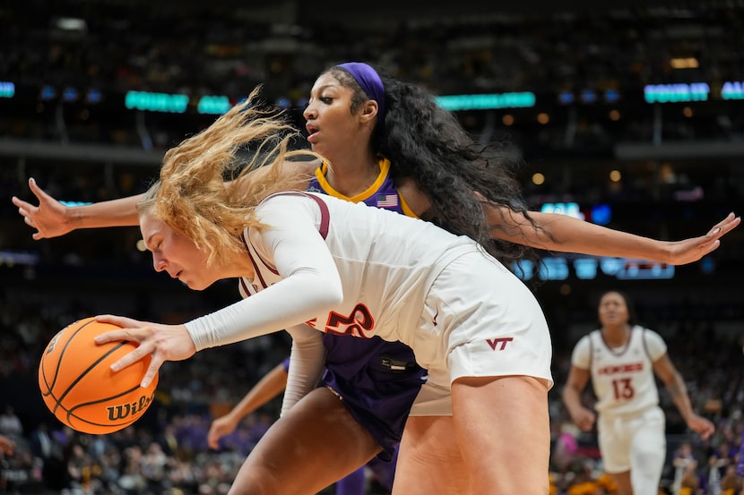 LSU forward Angel Reese (10) defends against Virginia Tech center Elizabeth Kitley (33)...