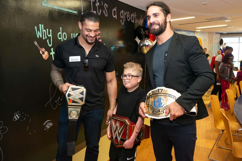 Patient Jacob Mowl (Patient, 15 y/o) takes a photo wearing one of the WWE Champions belts...