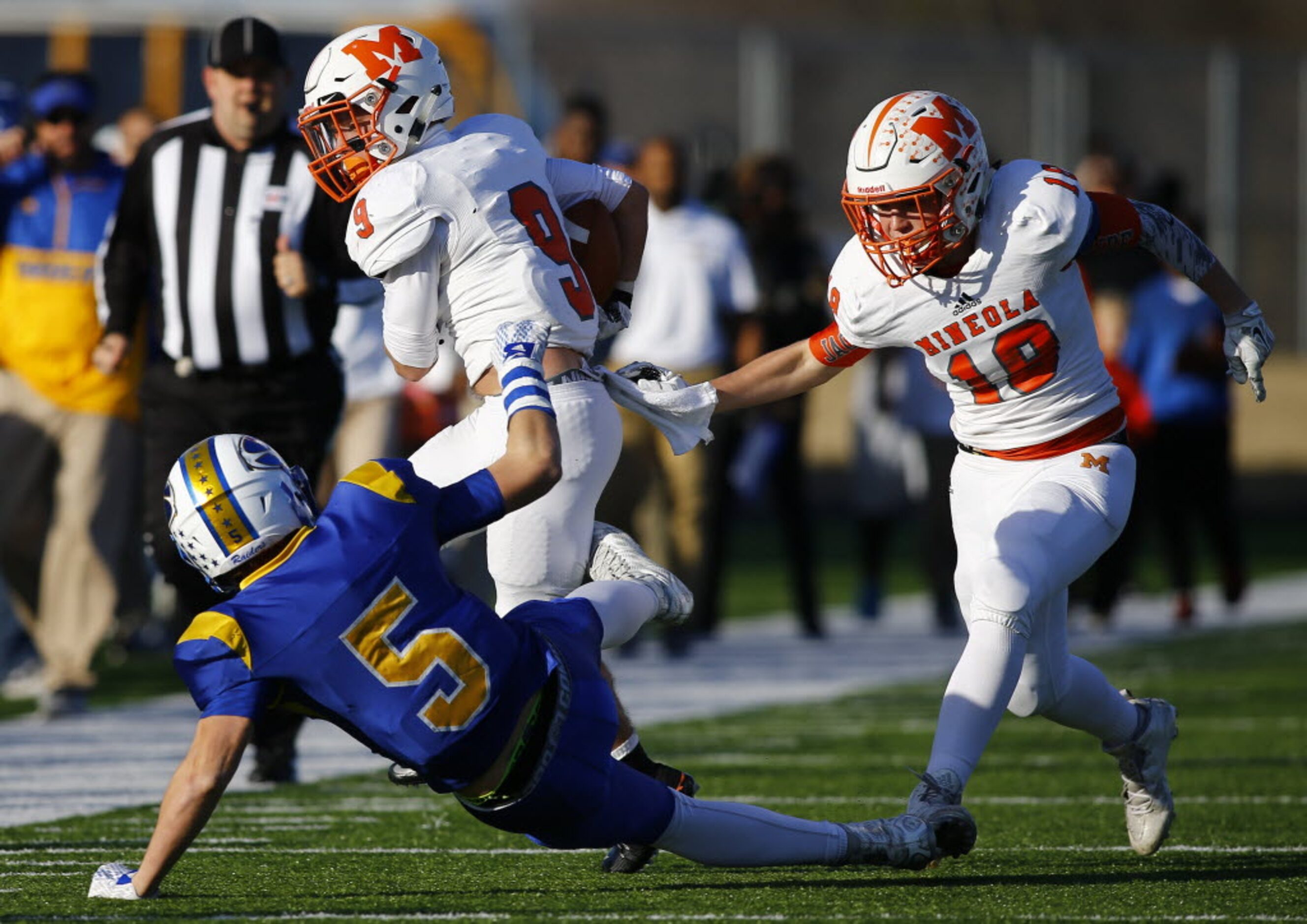 TXHSFB Mineola's Chantz Perkins (9) plows over Sunnyvale's Cash Goodhart (5) as Kartney...