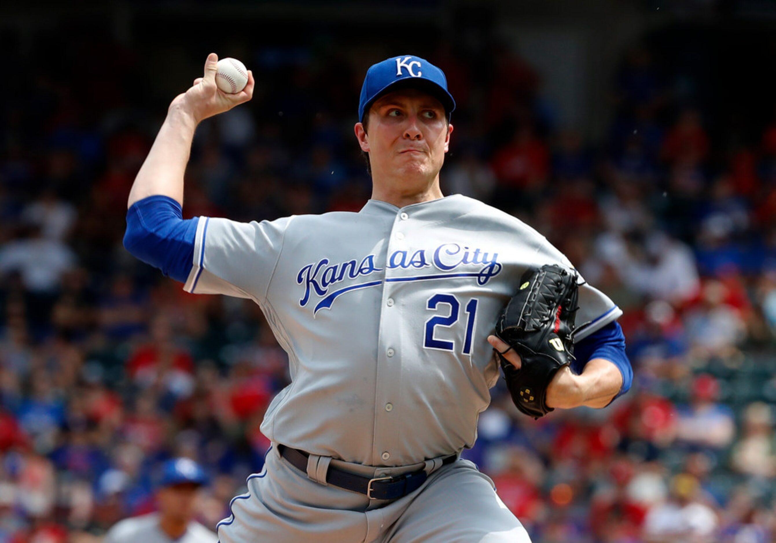 Kansas City Royals starting pitcher Homer Bailey (21) throws to the Texas Rangers in the...