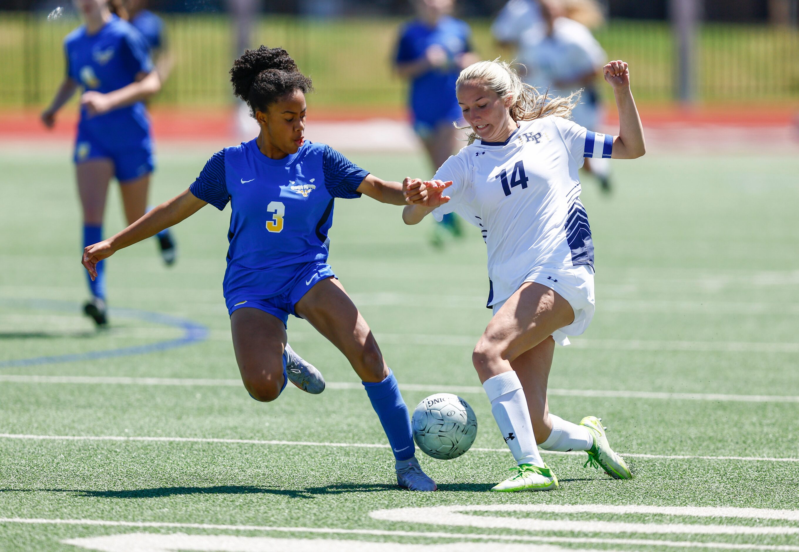 Frisco’s Maiya Haliburton (3) and Highland Park’s Parker Hart (14) battle for the ball...