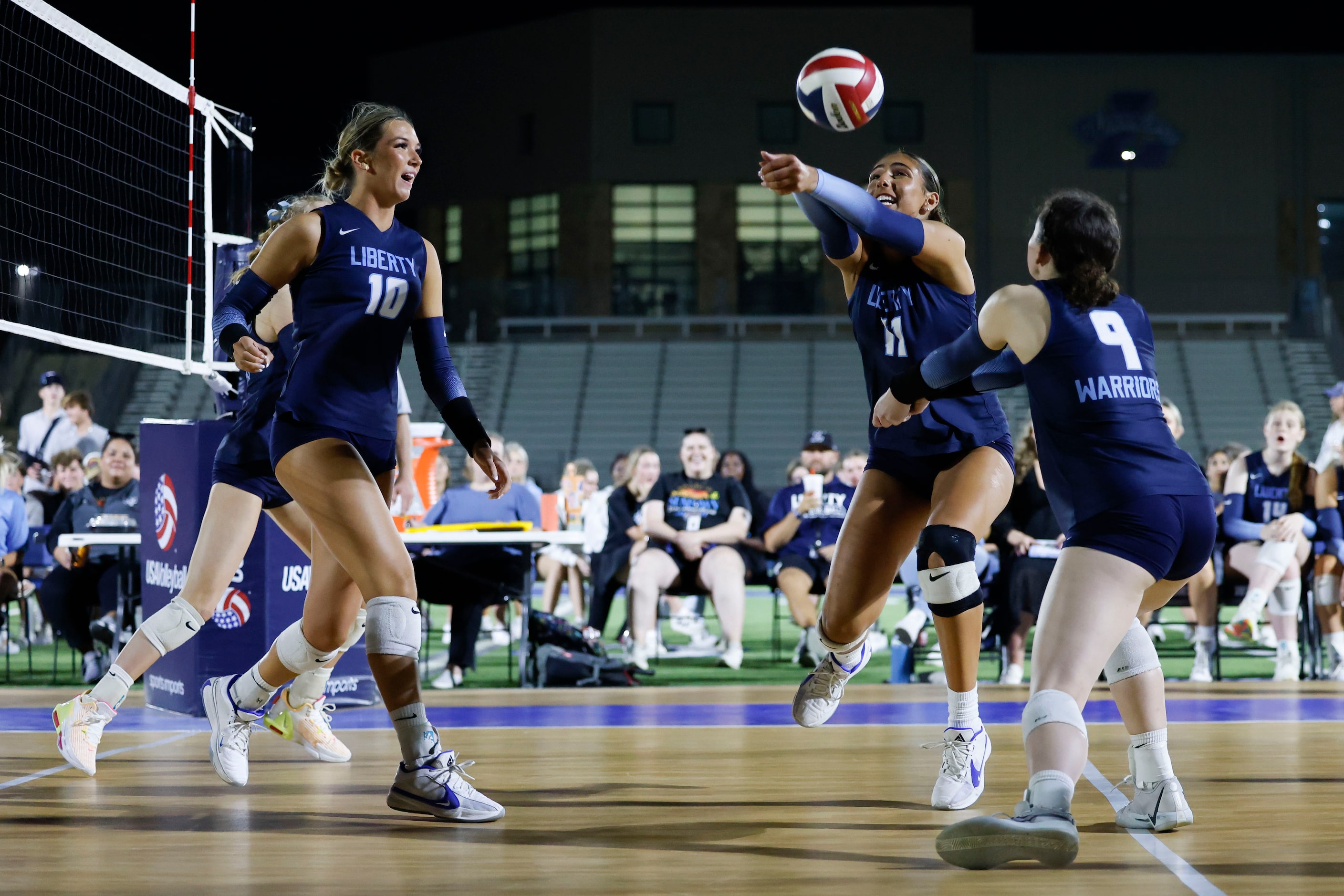 Liberty Christian School’s Naya Sal-feet-e (center) sets up for a teammate during the second...