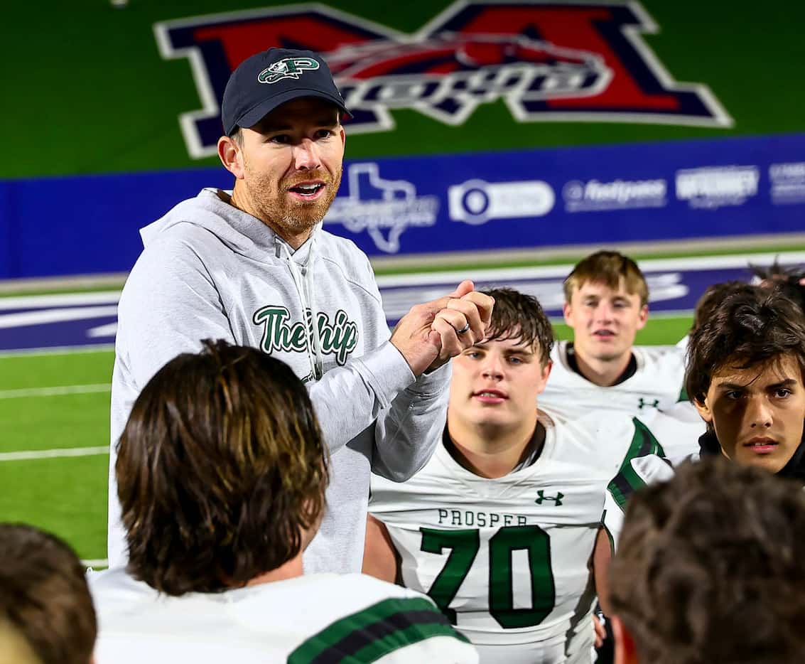 Prosper head coach Tyler Moore talks with his team after their victory over McKinney, 24-12...