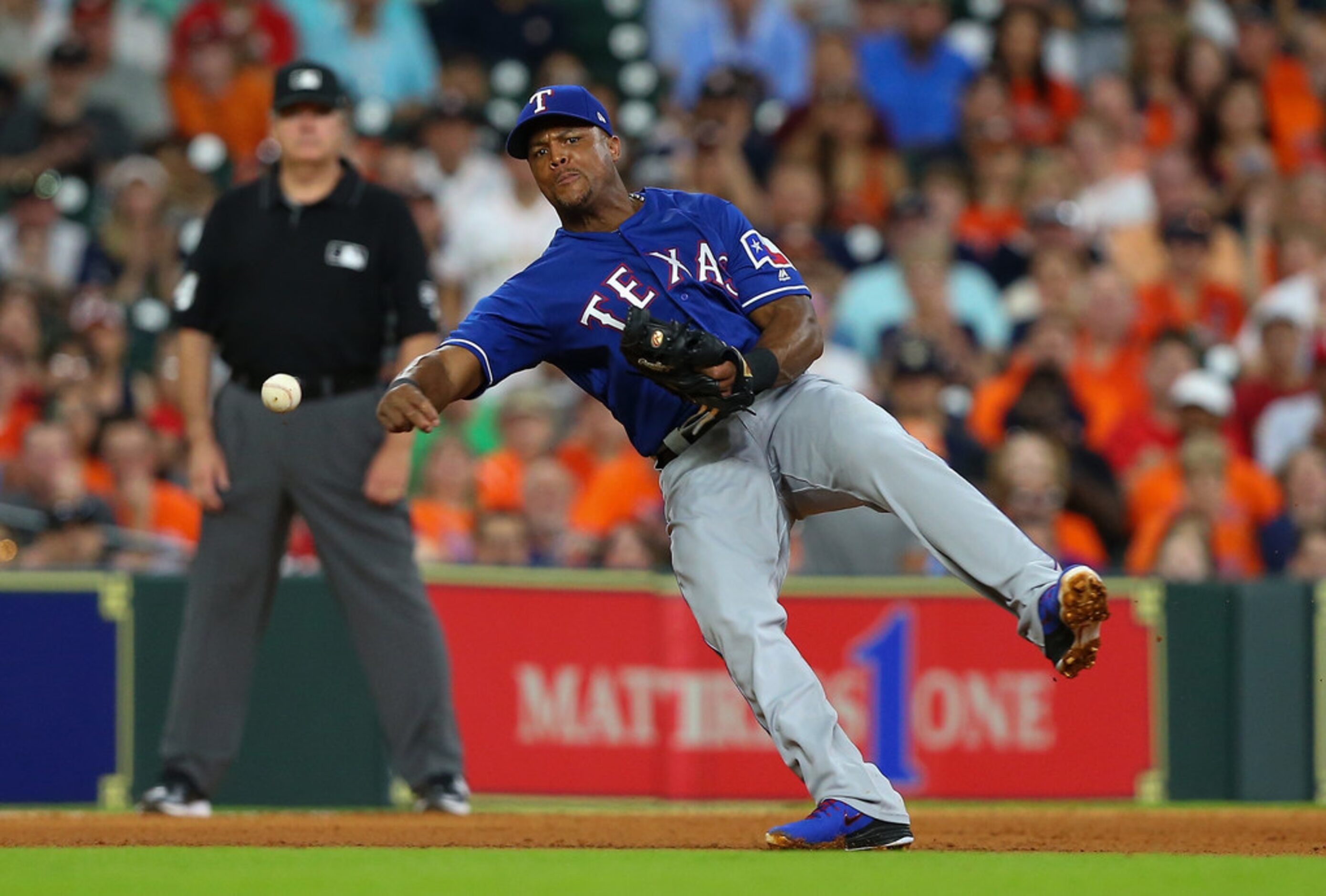 HOUSTON, TX - MAY 11:  Adrian Beltre #29 of the Texas Rangers throws to first base in the...