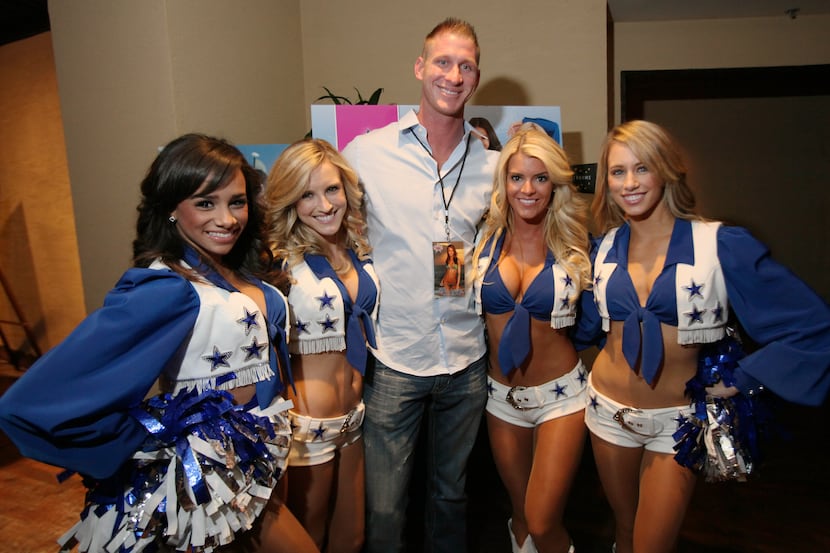 Fan Matthew Miller of Lewisville is photographed with Dallas Cowboys Cheerleader "rookies"...