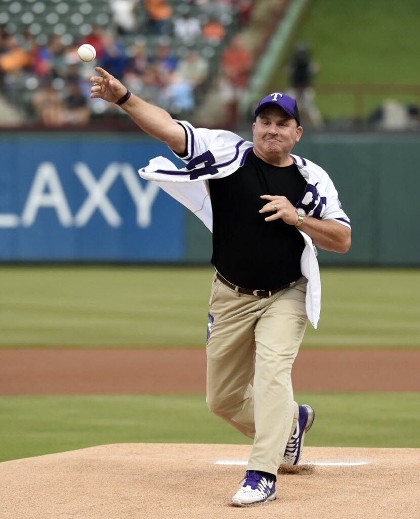 TCU football coach Gary Patterson throws out the ceremonial first pitch prior to the Texas...