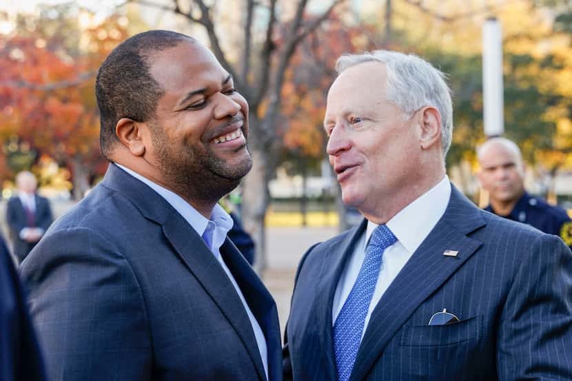 Dallas Mayor Eric Johnson (left) laughs with Ross Perot Jr. before a ceremony announcing a...