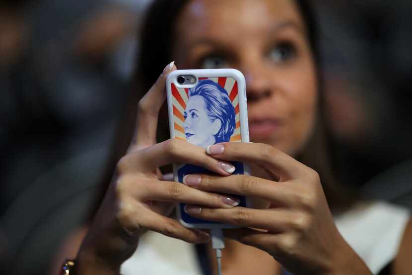An attendee held a phone with a Hillary Clinton-themed case at the Democratic National...