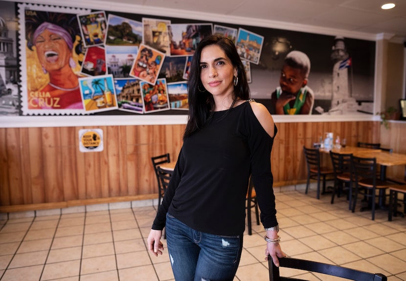 Co-owner Lidisy Becerra in the main dining hall of Caribbean Cuba restaurant in Carrollton