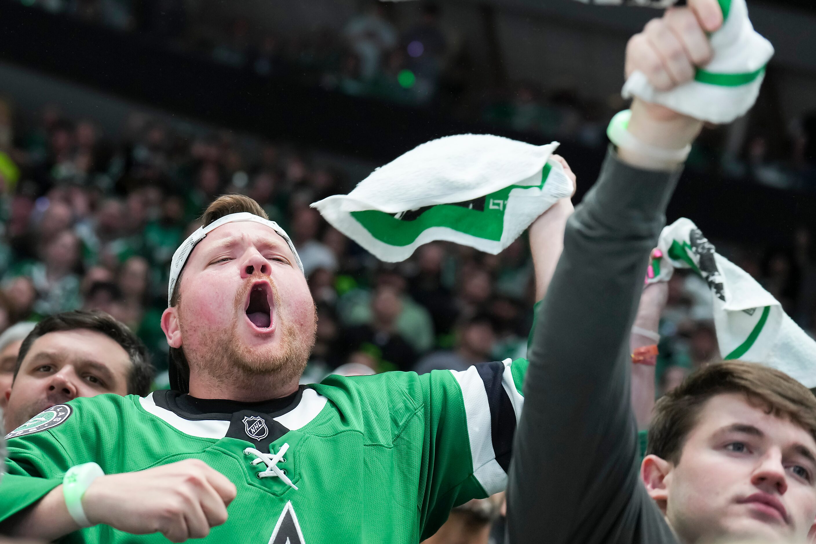 Dallas Stars fans react after a hit against center Joe Pavelski during the second period in...