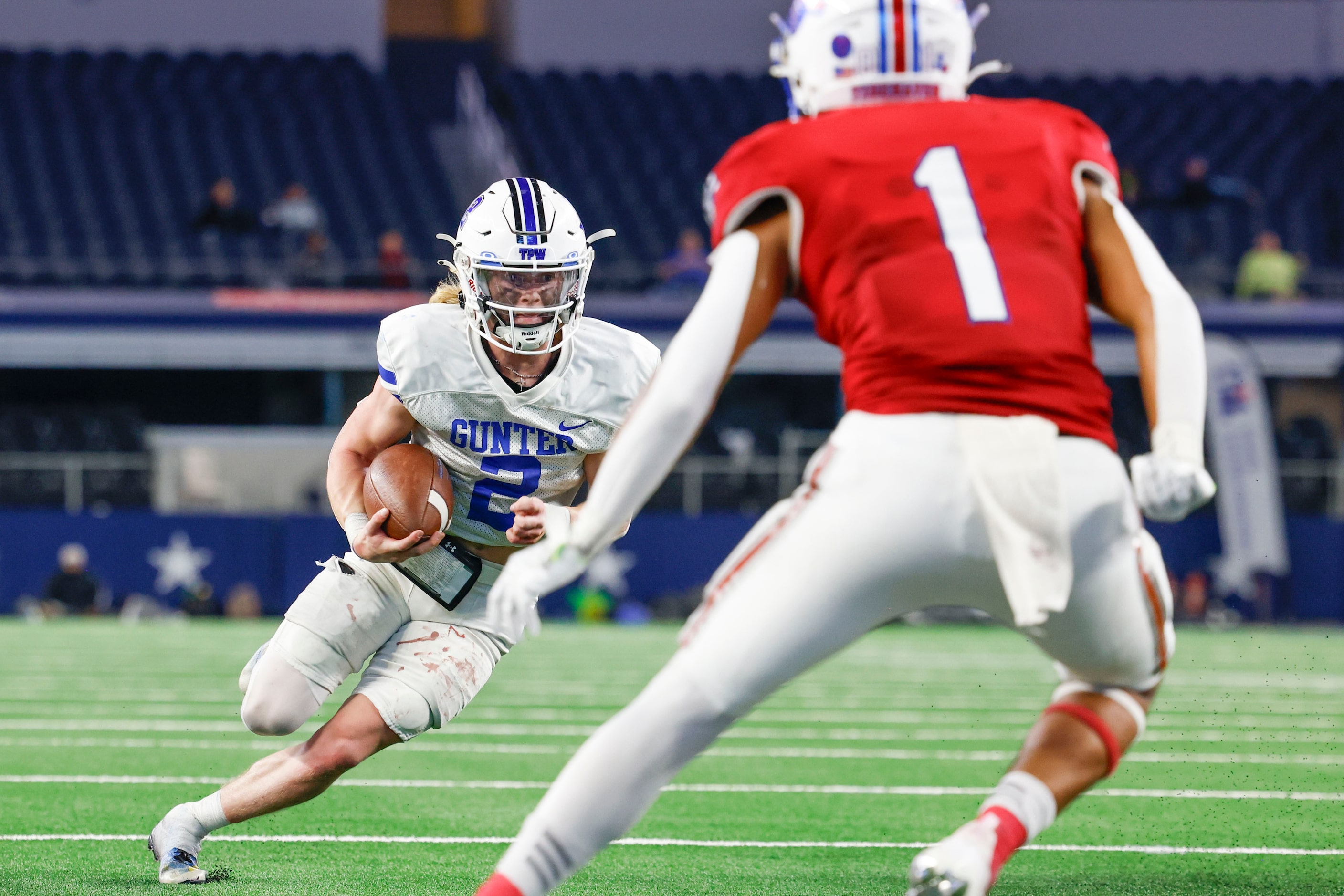 Gunter High’s Walker Overman goes for a touchdown run against El Maton Tidehaven’s Ricky...