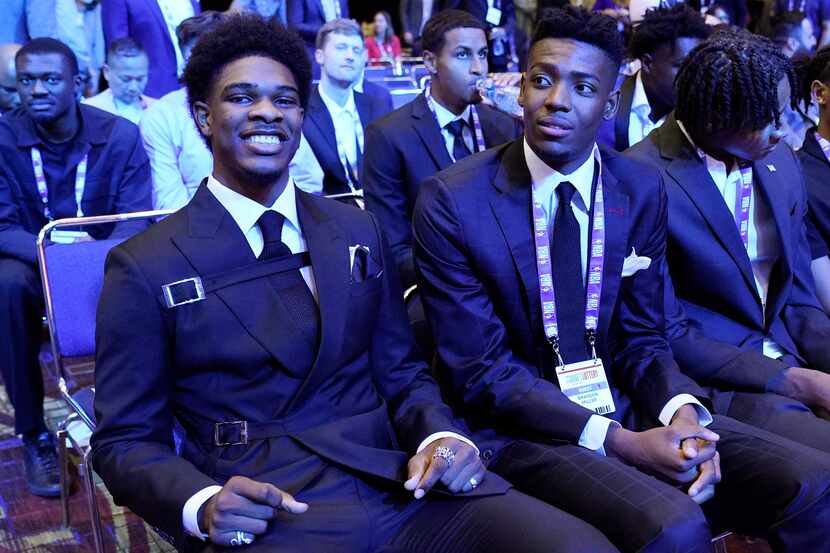 Scoot Henderson, left, and Brandon Miller attend the NBA basketball draft lottery in Chicago...