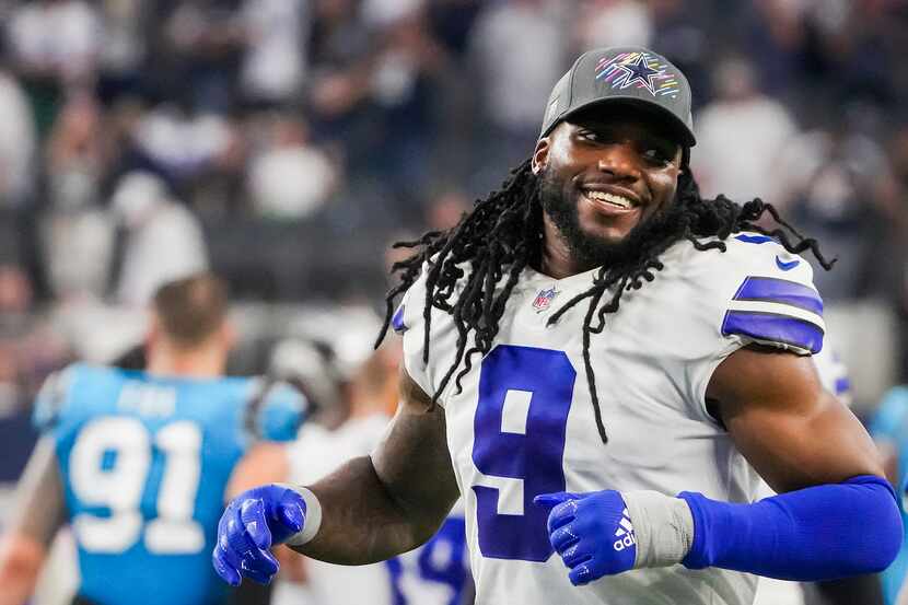 Dallas Cowboys middle linebacker Jaylon Smith smiles as he leaves the field after the...