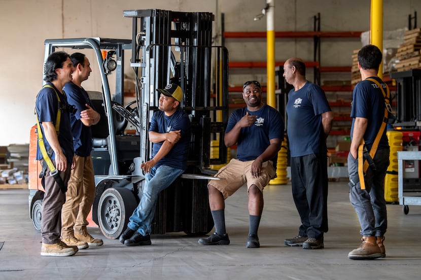 Elliott Electrical Supply refugee employees Asif Ali, Muzamil Mehdi, Hussain Aklaqi,...