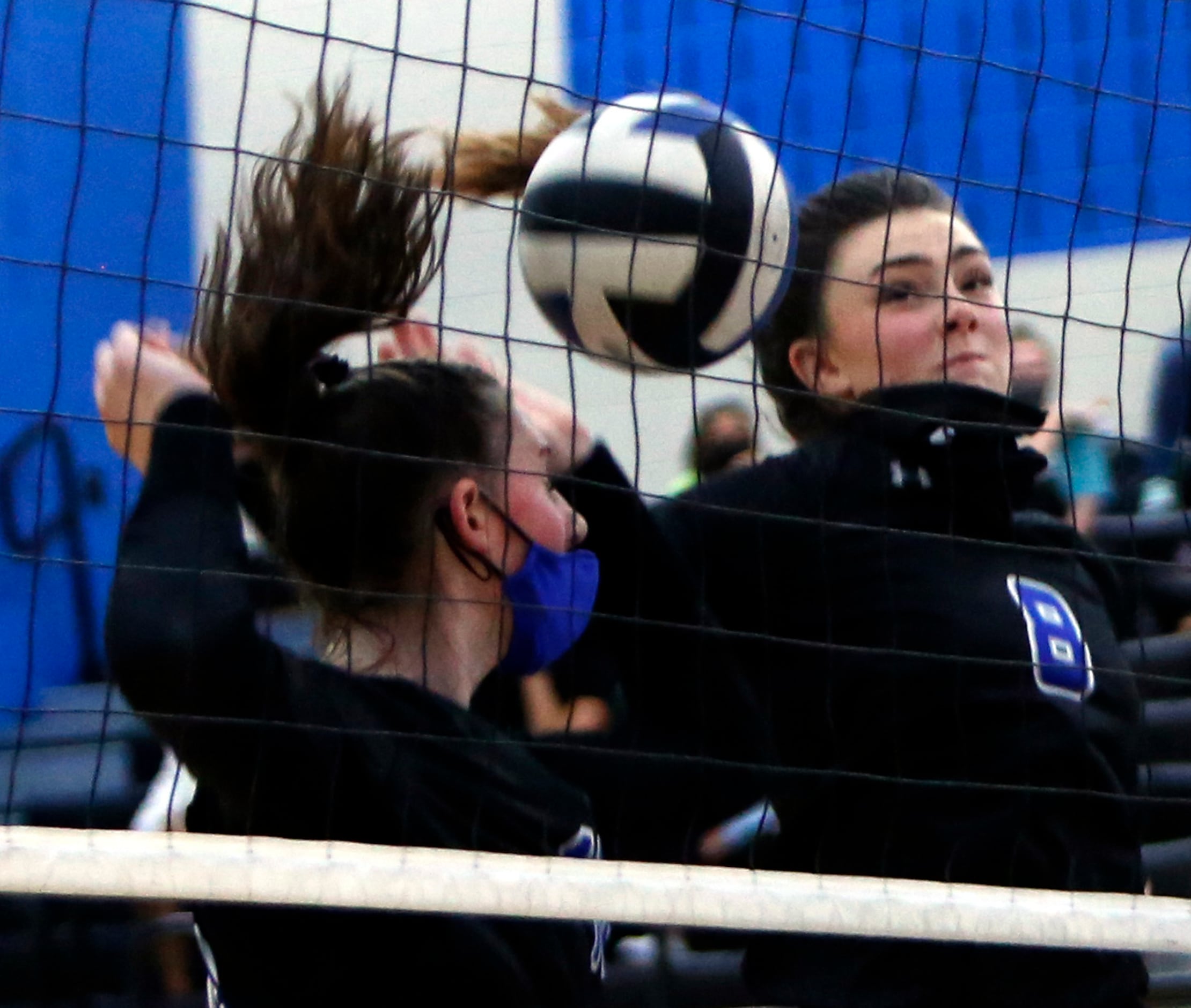 After teaming  to block a shot, Trophy Club Byron Nelson's Katelynn Croshaw (8), right, and...