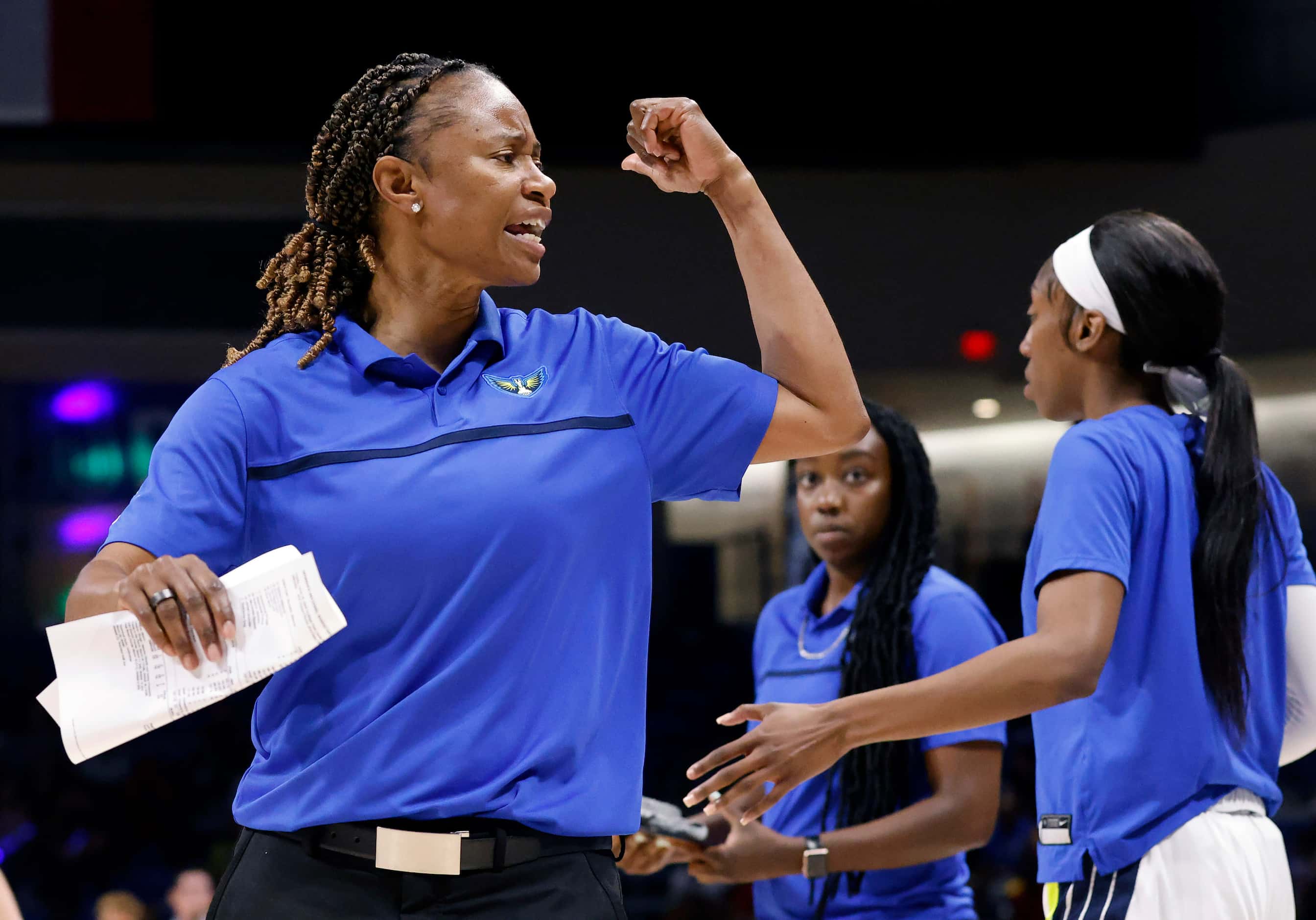 Dallas Wings head coach Vickie Johnson yells for players to get in the game during the...