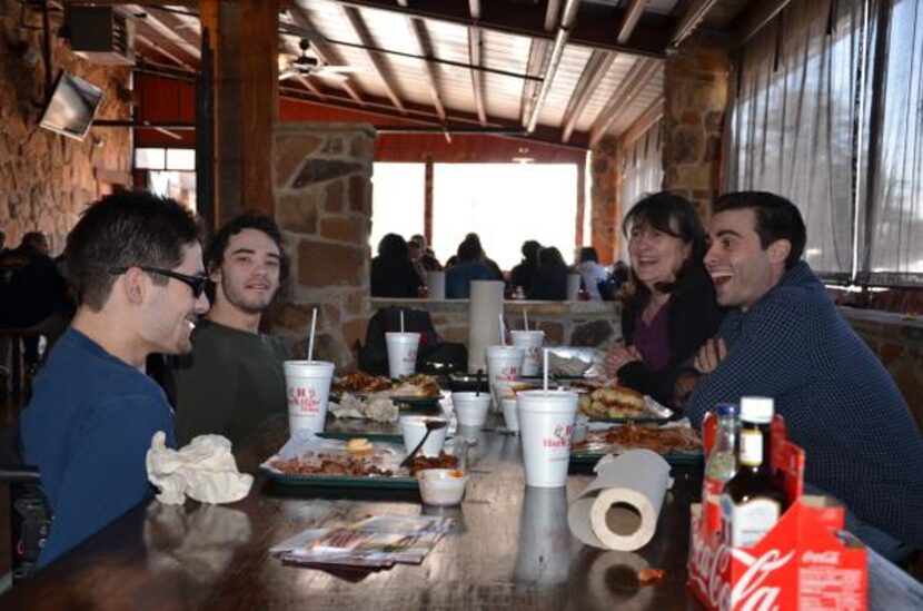 
Dagley family members, from left, Alex, Jason, Lisa and Adam, share a laugh while out to...