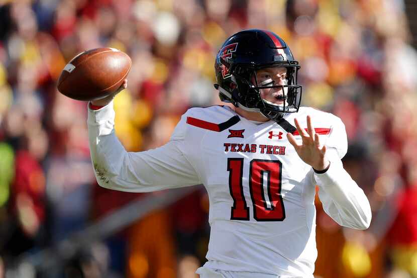 Texas Tech quarterback Alan Bowman throws a pass during the first half of an NCAA college...